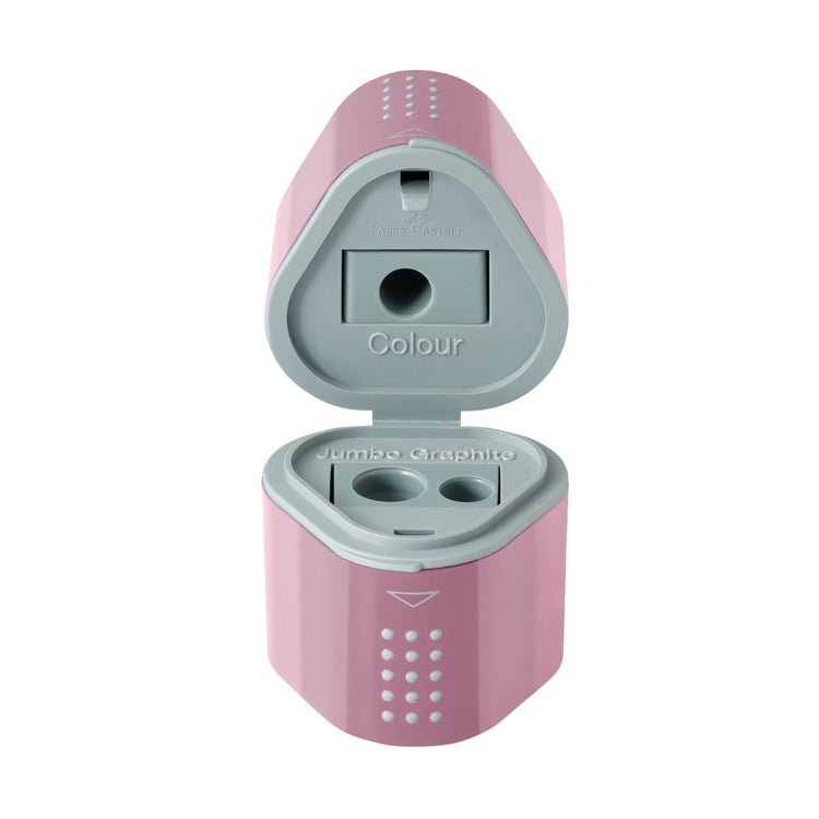 Image shows a rose pink Faber-Castell trio hole sharpener