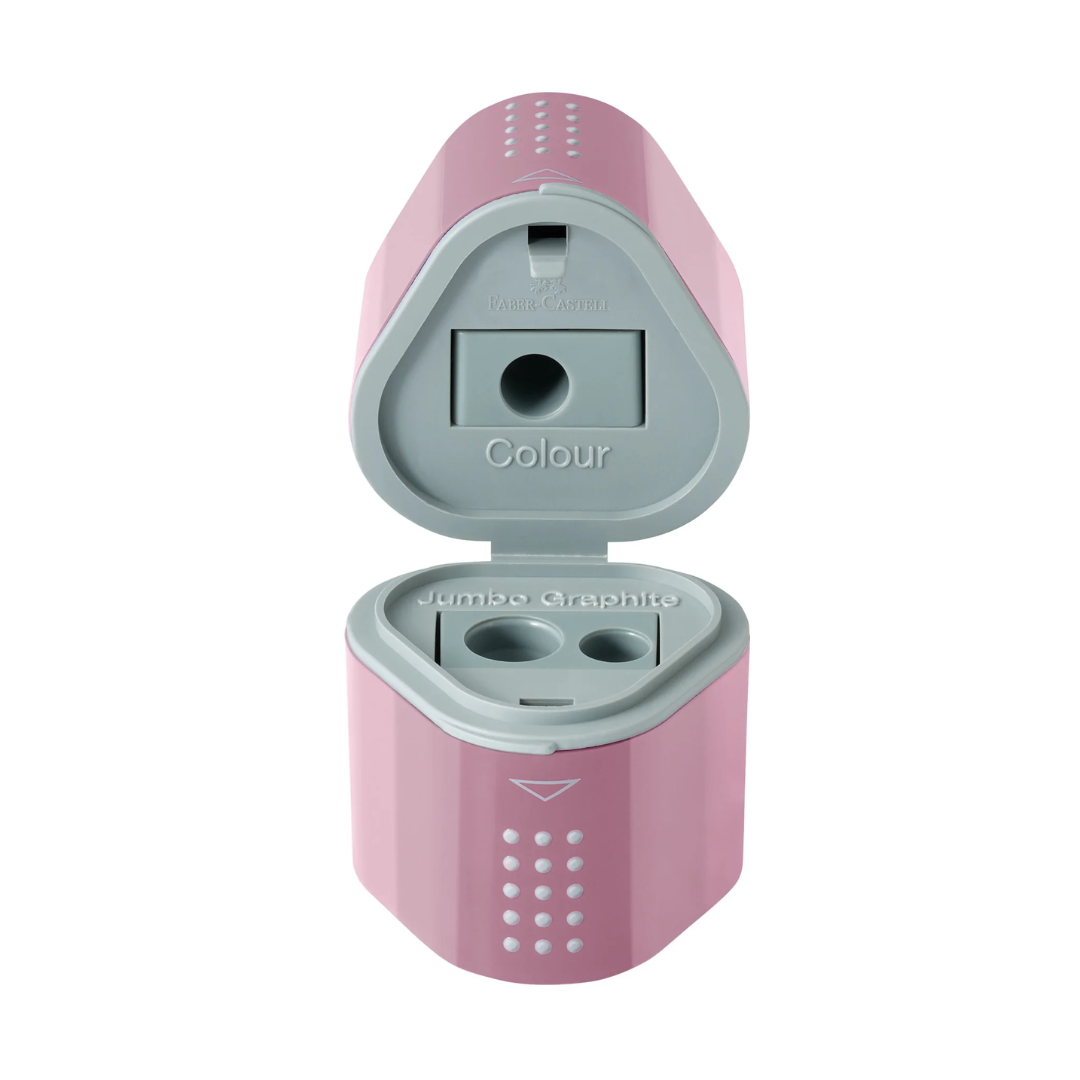 Image shows a rose pink Faber-Castell trio hole sharpener