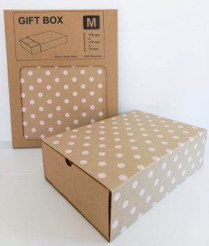 Image shows a pink polka dots gift box