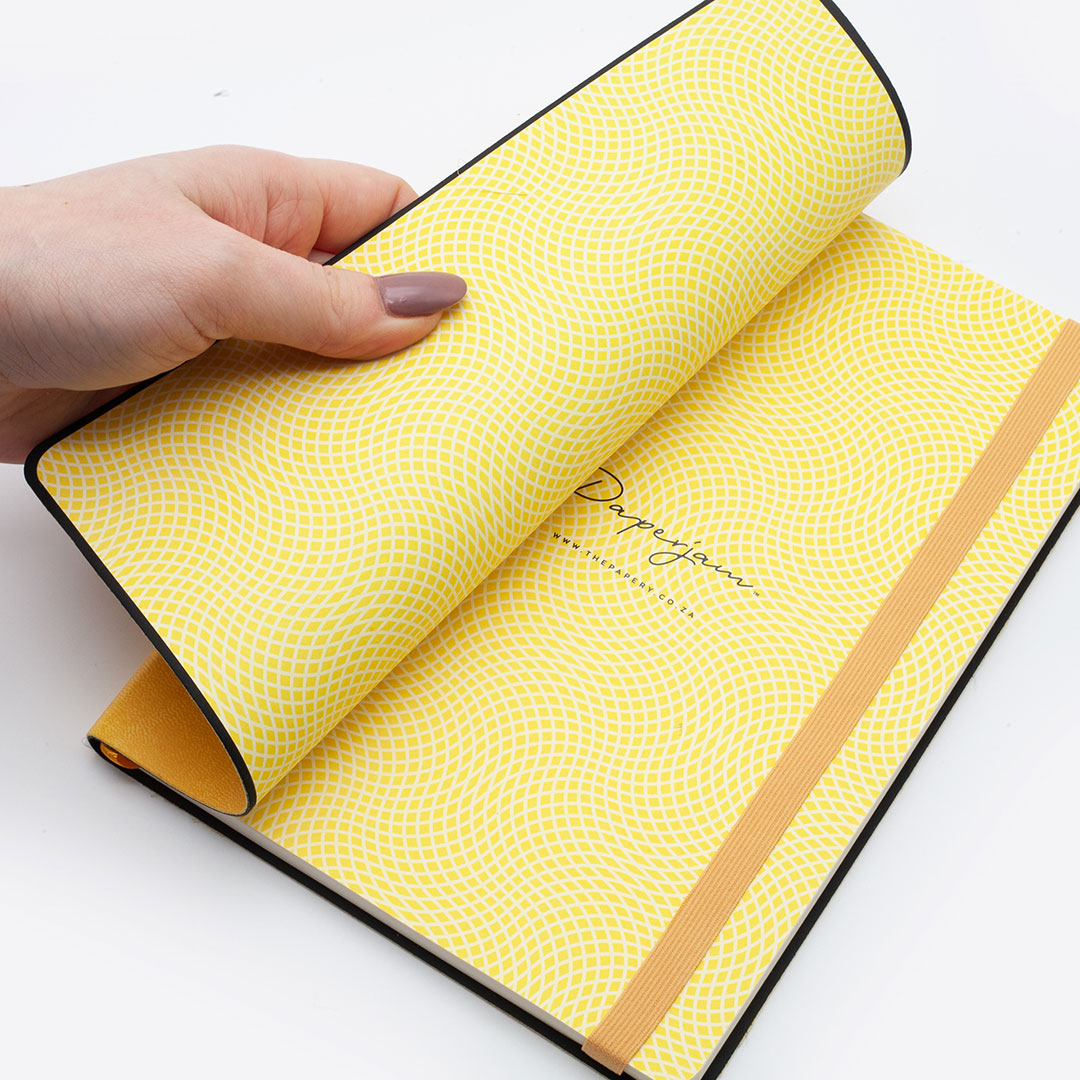 Image shows the endpapers of a yellow Flexi softcover journal