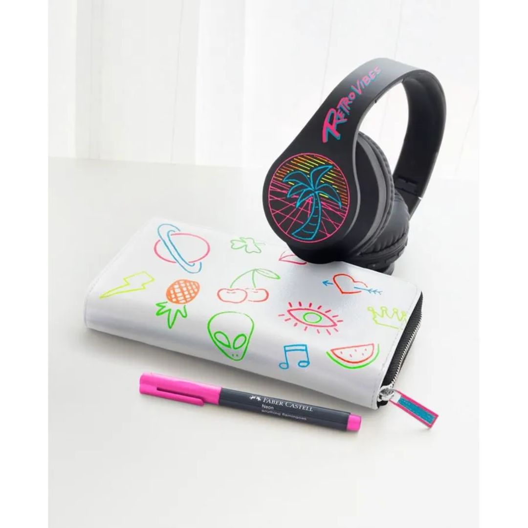 Image shows a pink Faber-Castell marker used on a headset