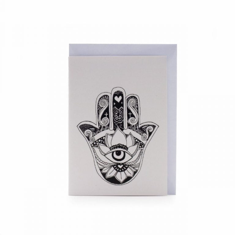 Image shows a greeting card with a "hamsa hand" illustration on it