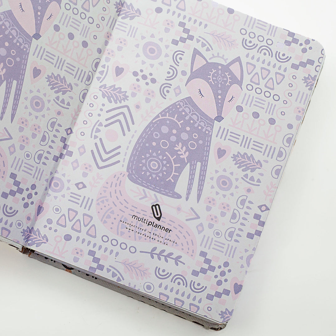 Image shows the endpapers of a Folk Art Fox Designer Multiplanner