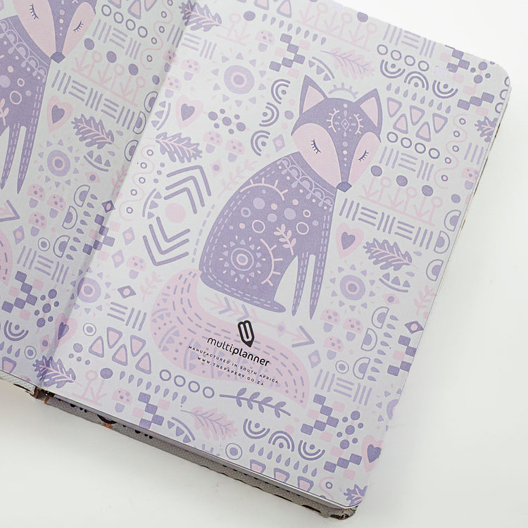 Image shows the endpapers of a Folk Art Fox Designer Multiplanner