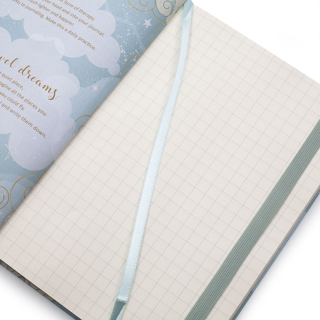 Image shows the dot grid pages of a Unicorn Dream Big journal
