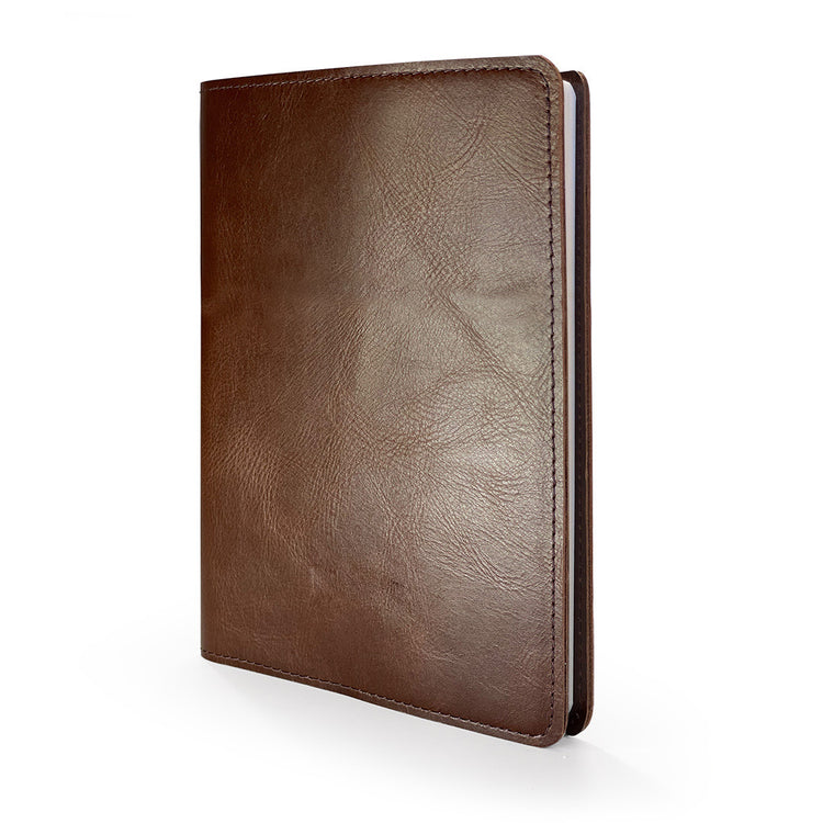 Image shows a brown Rustik leather slip on journal