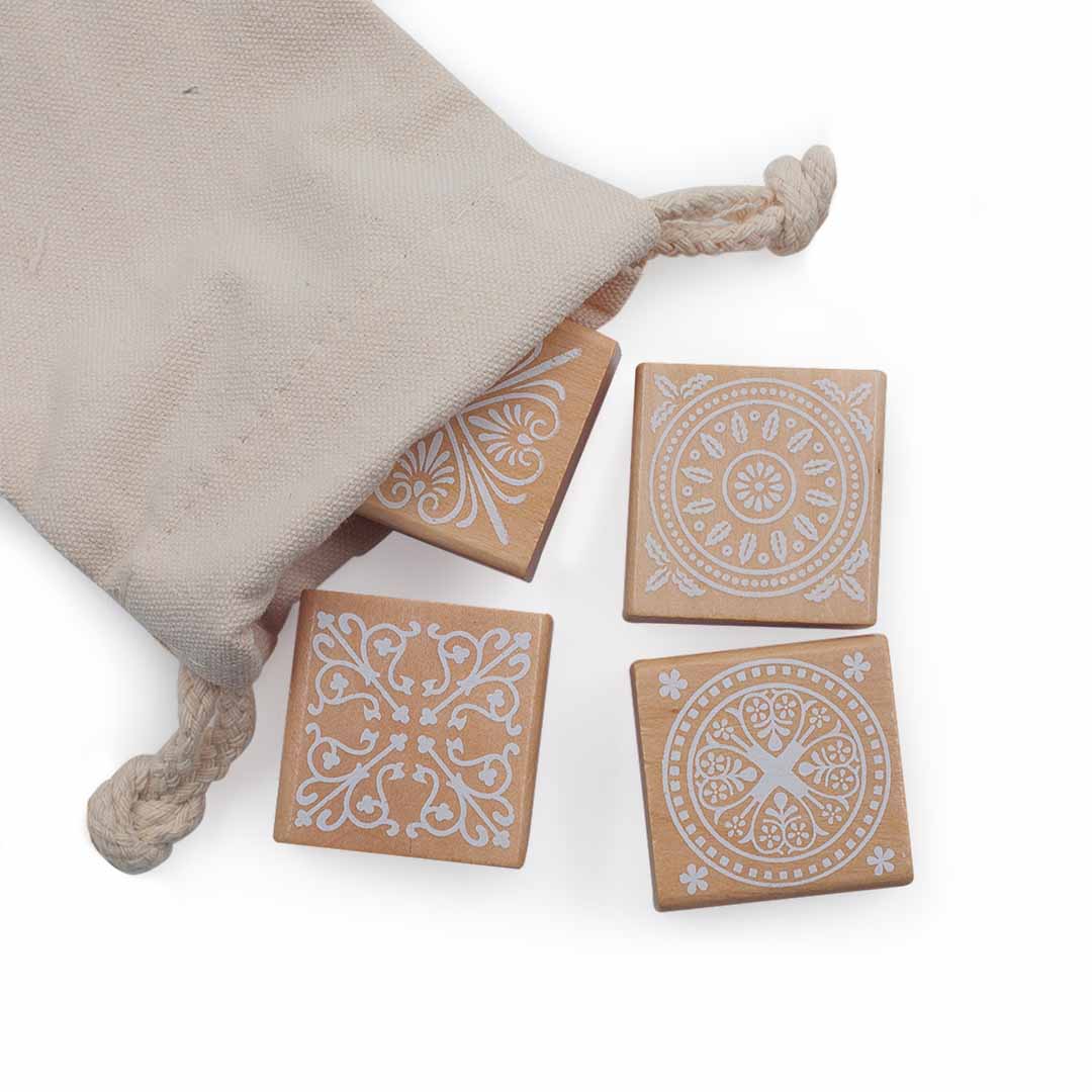 Image shows a set of wooden stamps with different designs