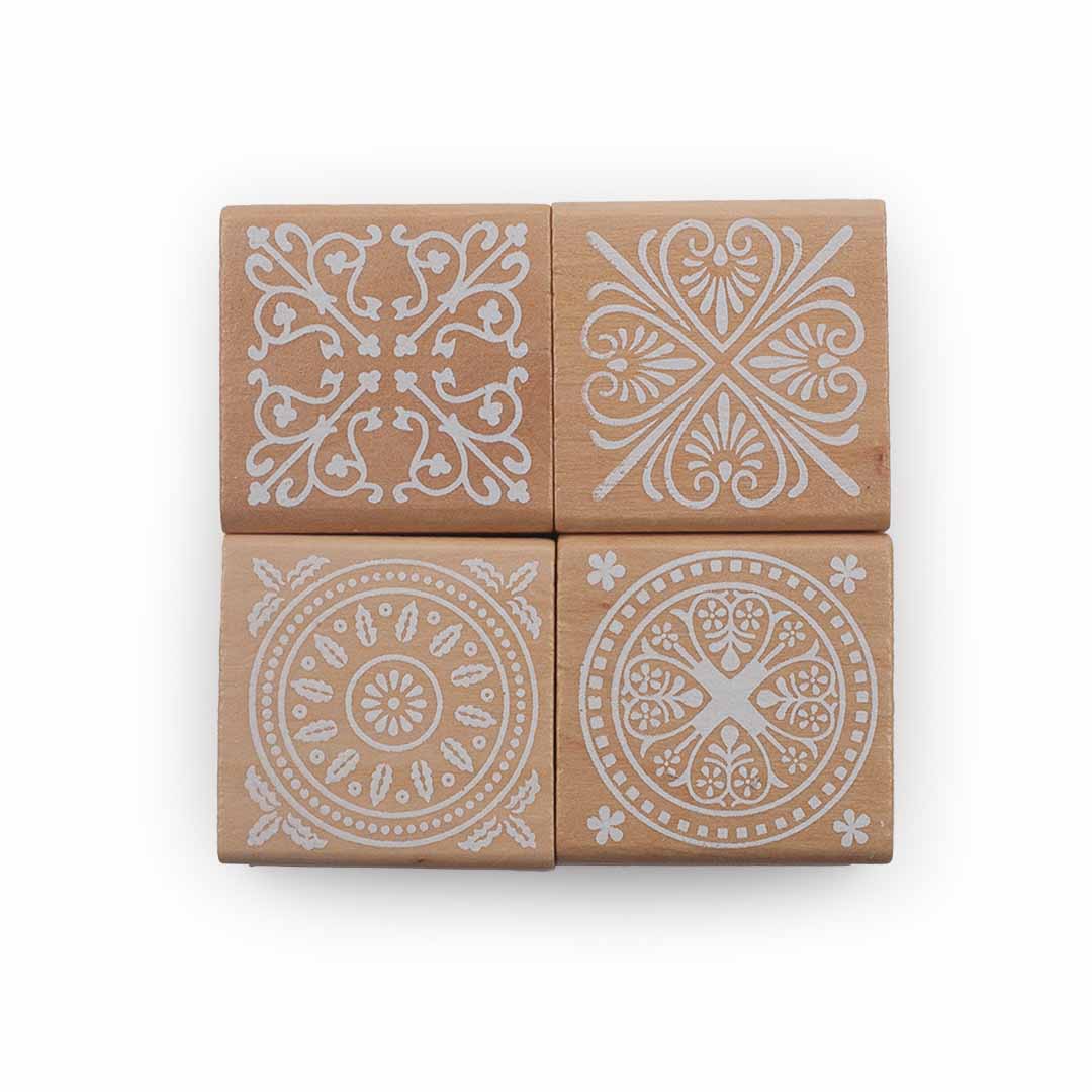 Image shows a set of wooden stamps with different designs