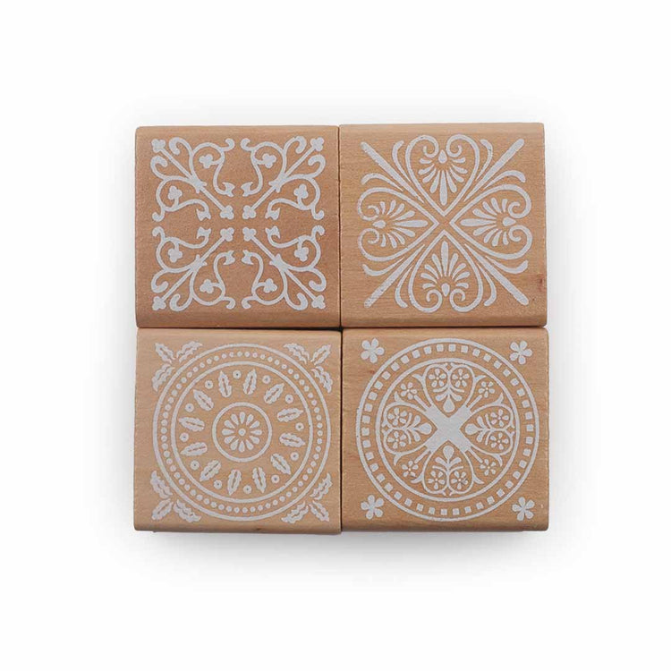 Image shows a set of wooden stamps with different designs