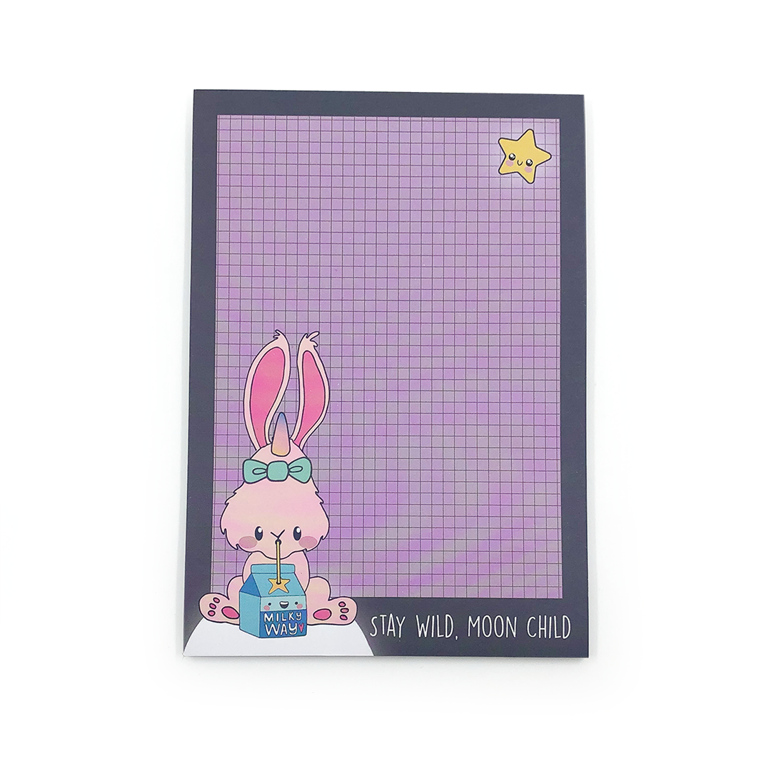 Image shows a notepad with a rabbit 
