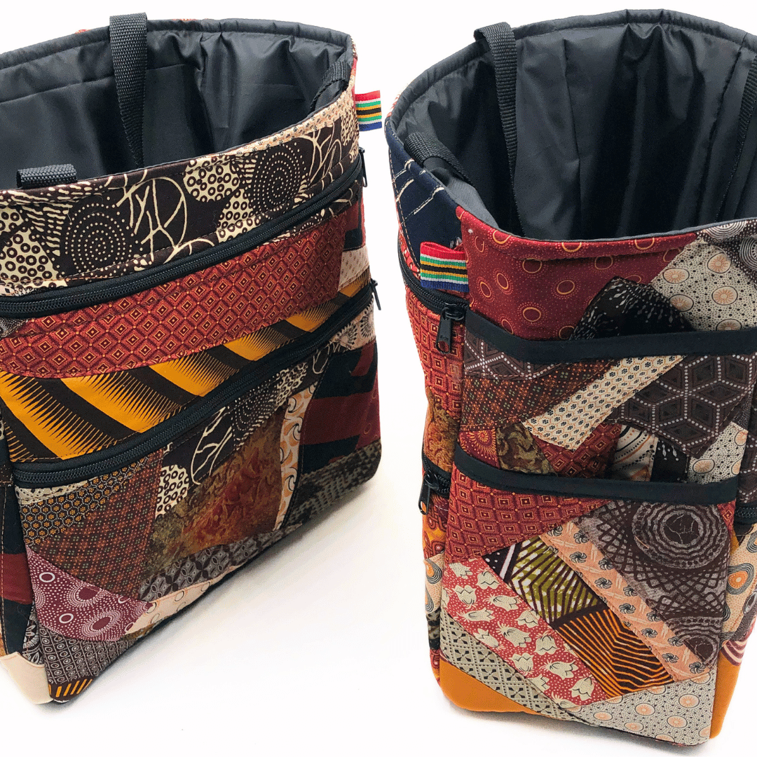 Two patchwork bags with colorful patterns on a white background