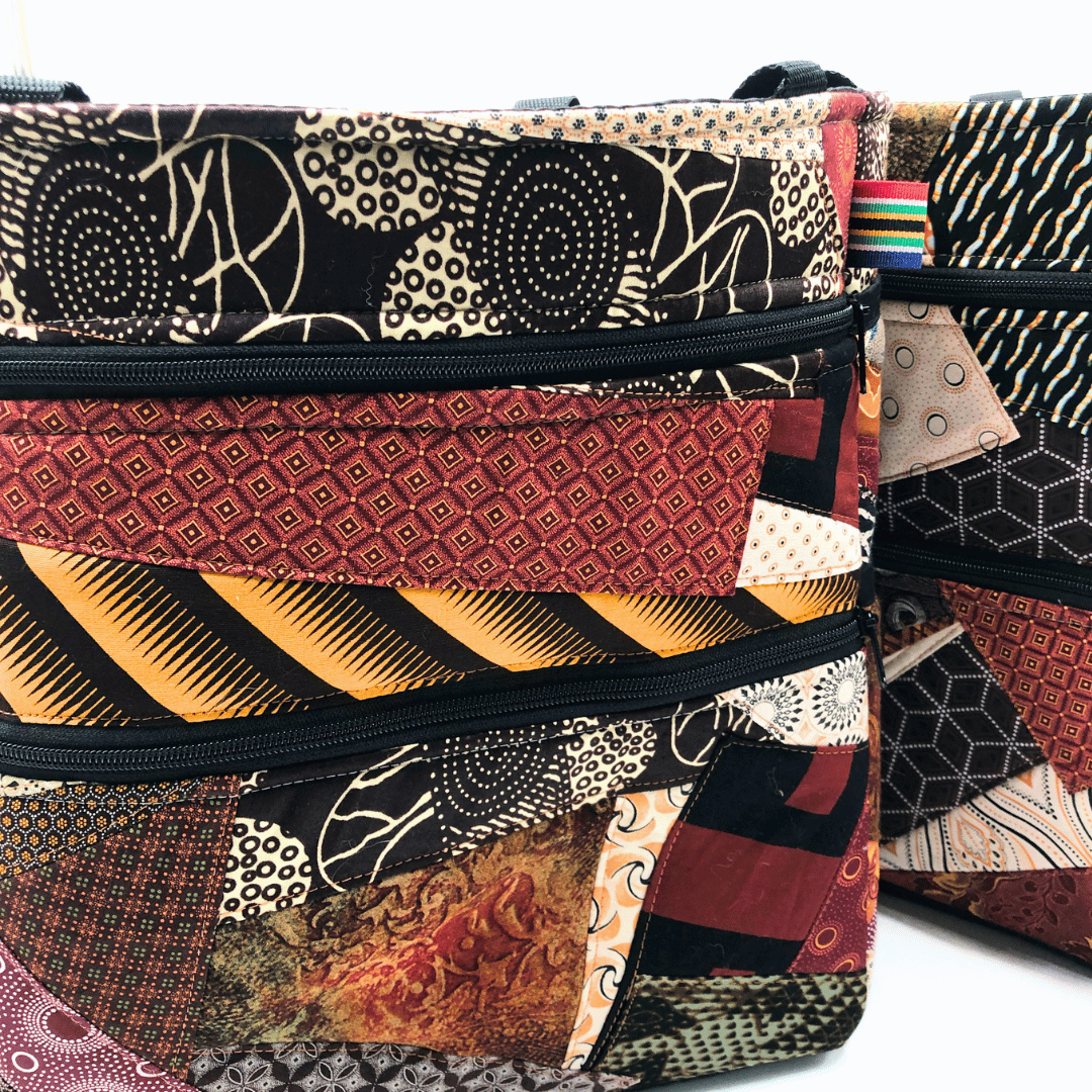 Patterned bags with a mix of colors and designs on a white background