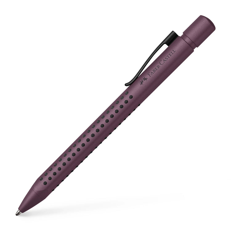 Image shows a berry colour Faber-Castell ballpoint pen 
