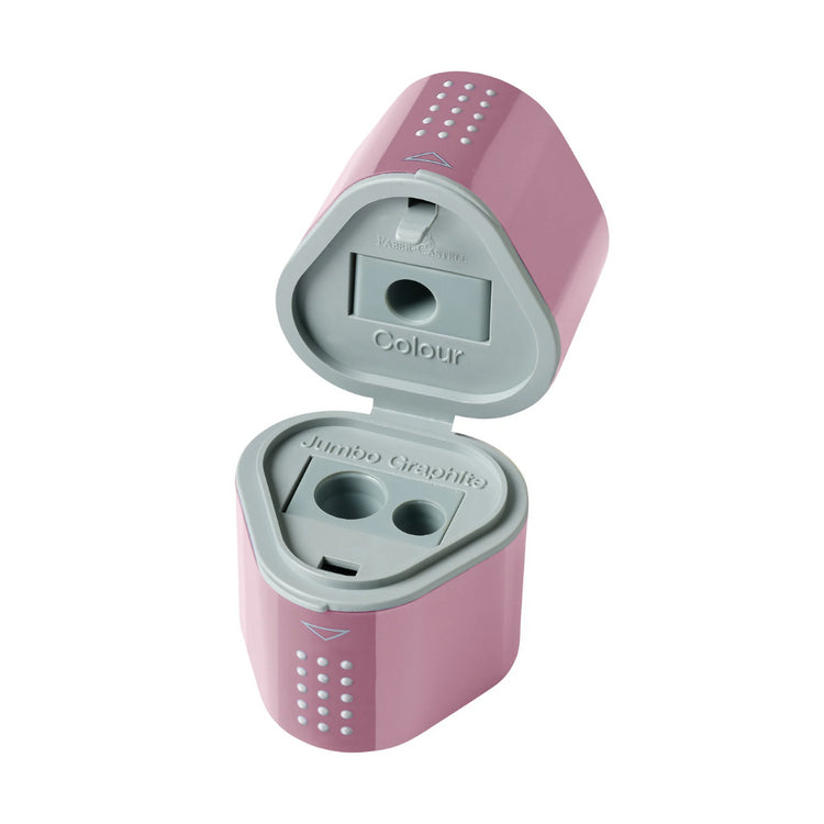 Image shows a rose pink Faber-Castell trio hole sharpener
