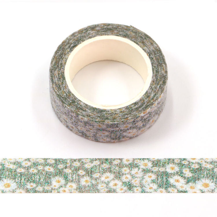 Image shows a washi tape with daisies and glitter 