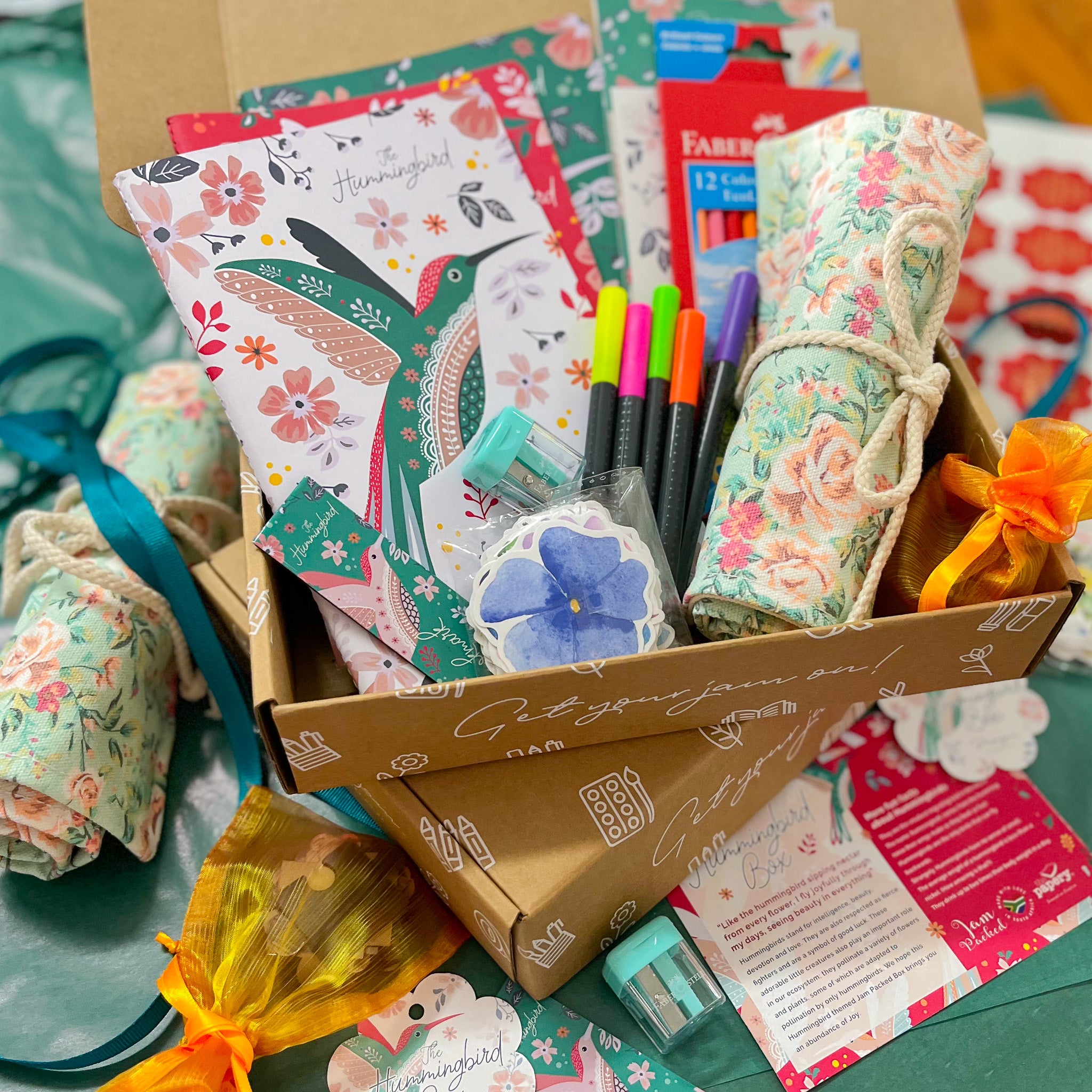 Image shows a hummingbird themed stationery box with it's contents