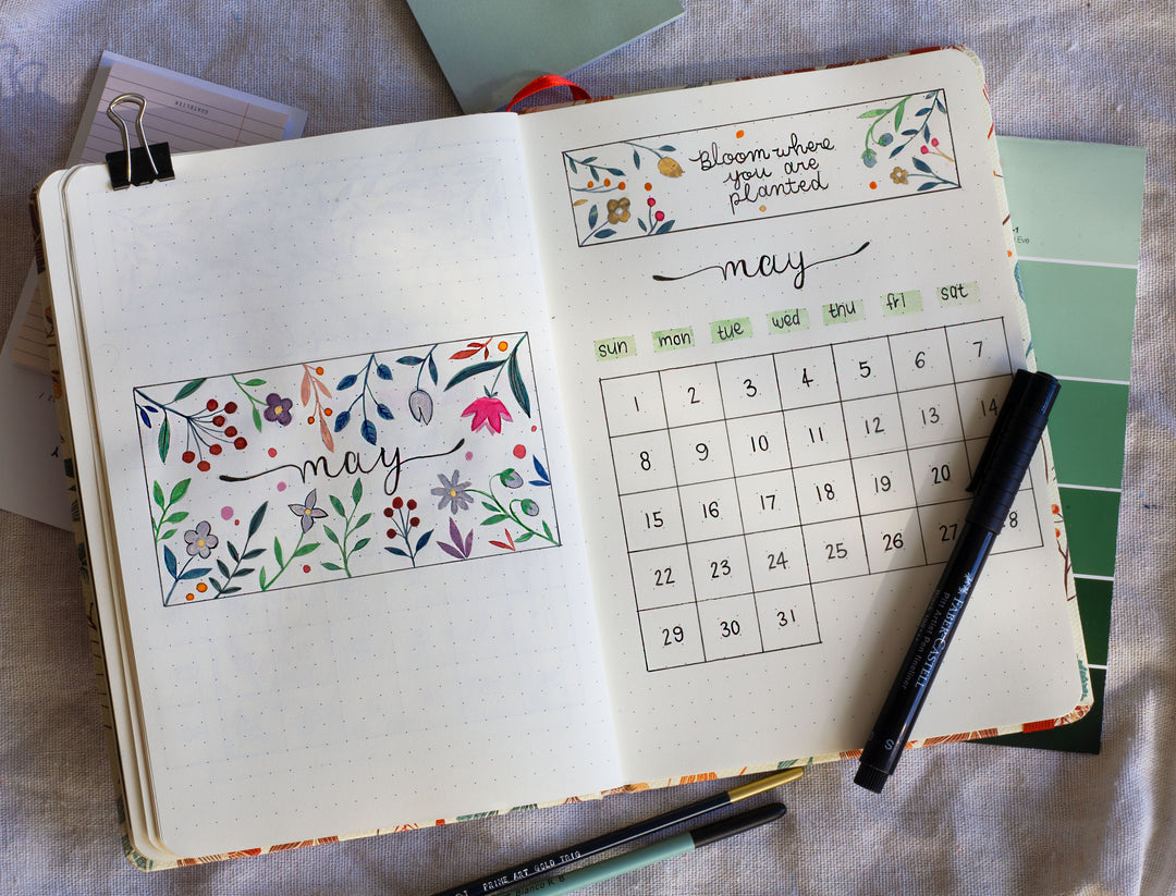 Image shows a journal spread in a premium dotted journal with assorted colours