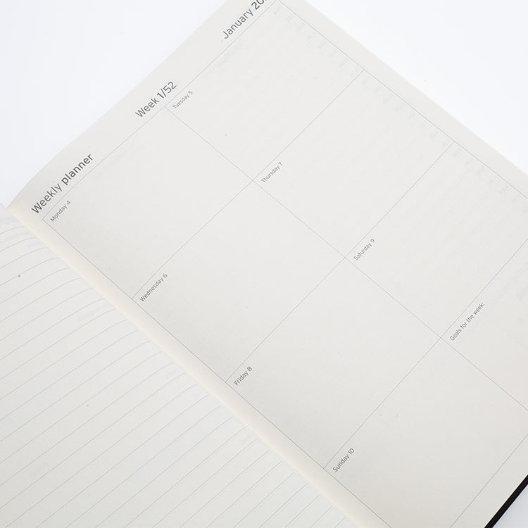 Image shows the weekly planner page in the Rustik Mauriati Planner