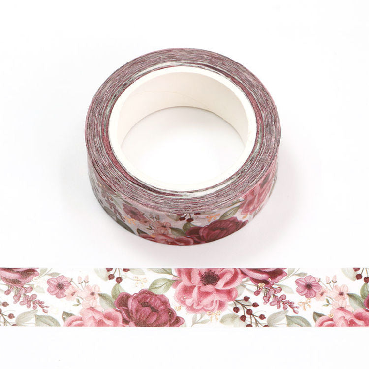 Image shows a washi tape with pink flowers and gold bows