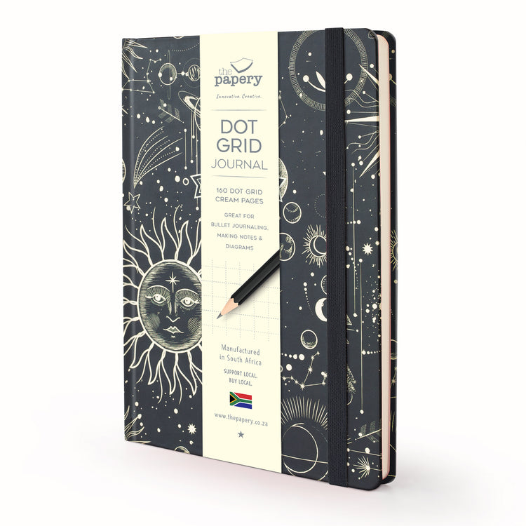 Image shows a retro sun moon stars dot grid journal
