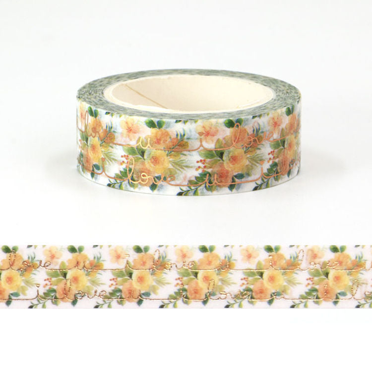 Image shows a washi tape with yellow roses 