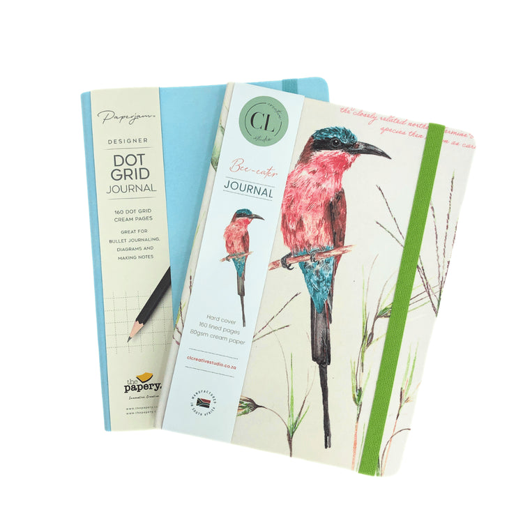 Two notebooks with different designs on a white background