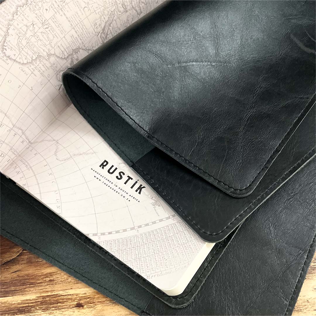 Image shows a black rustik leather journal cover