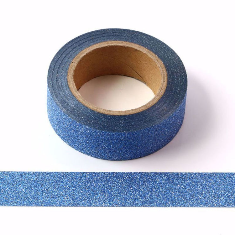 Roll of blue glitter  washi tape on a white background