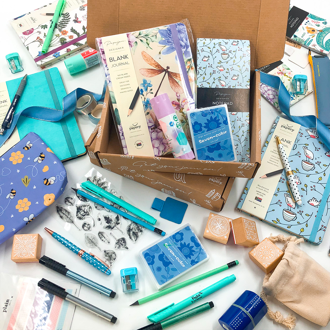 Image shows a stationery box with blue themed stationery