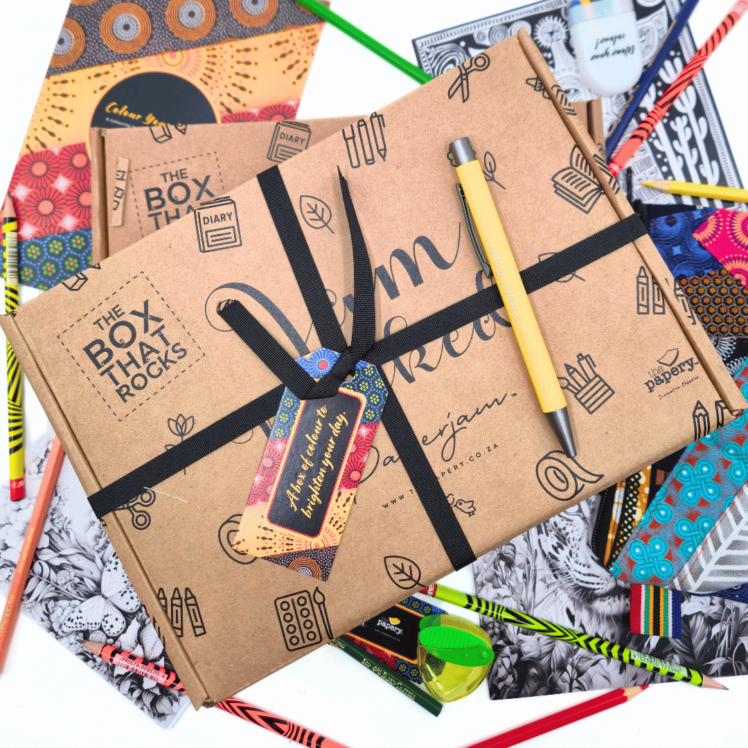 Notebooks with stationery items on a colorful background