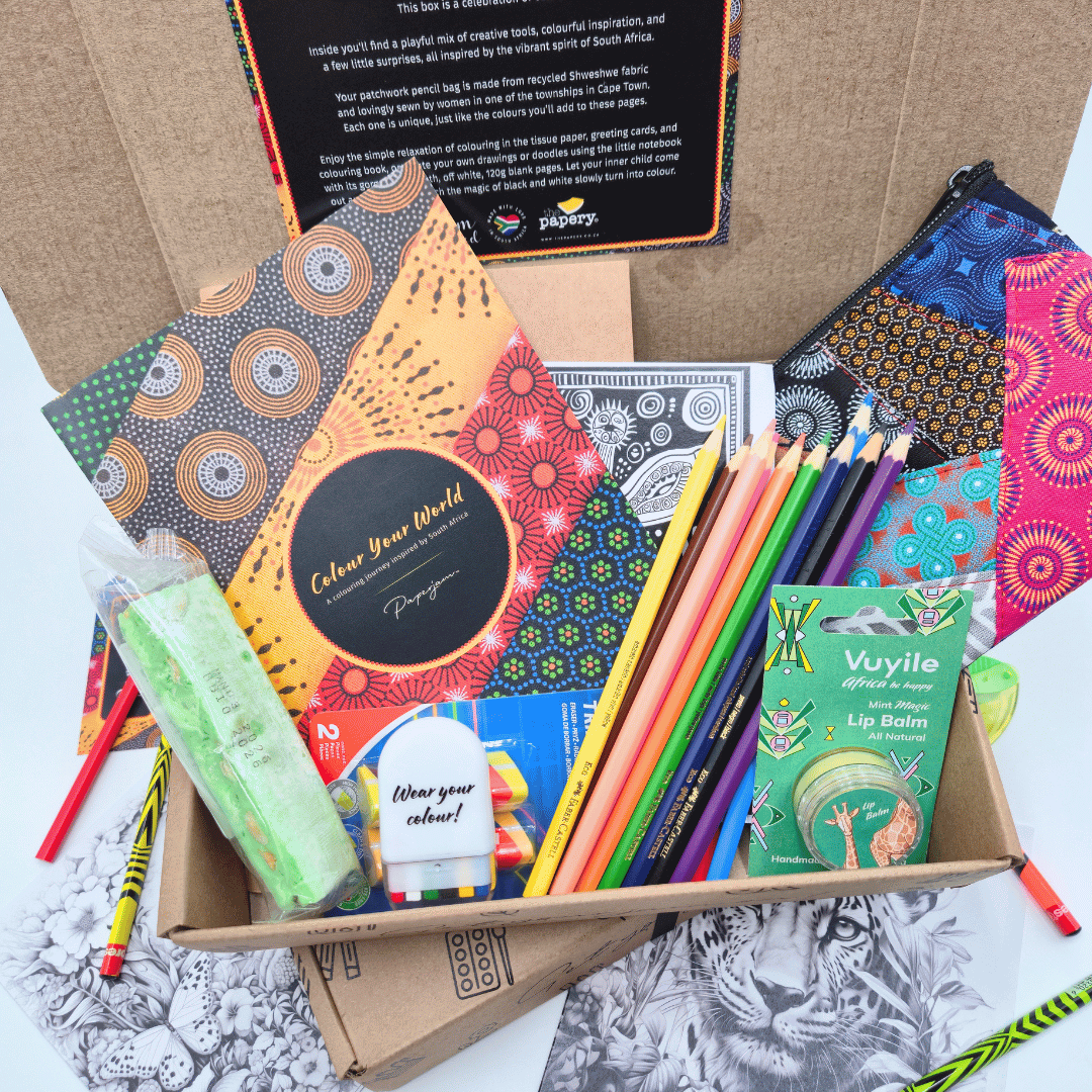 Coloring kit with notebooks, pencils, and lip balm in a box