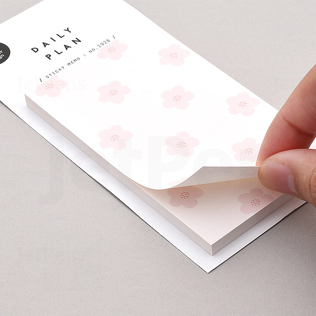 Image shows a pink flower memo pad