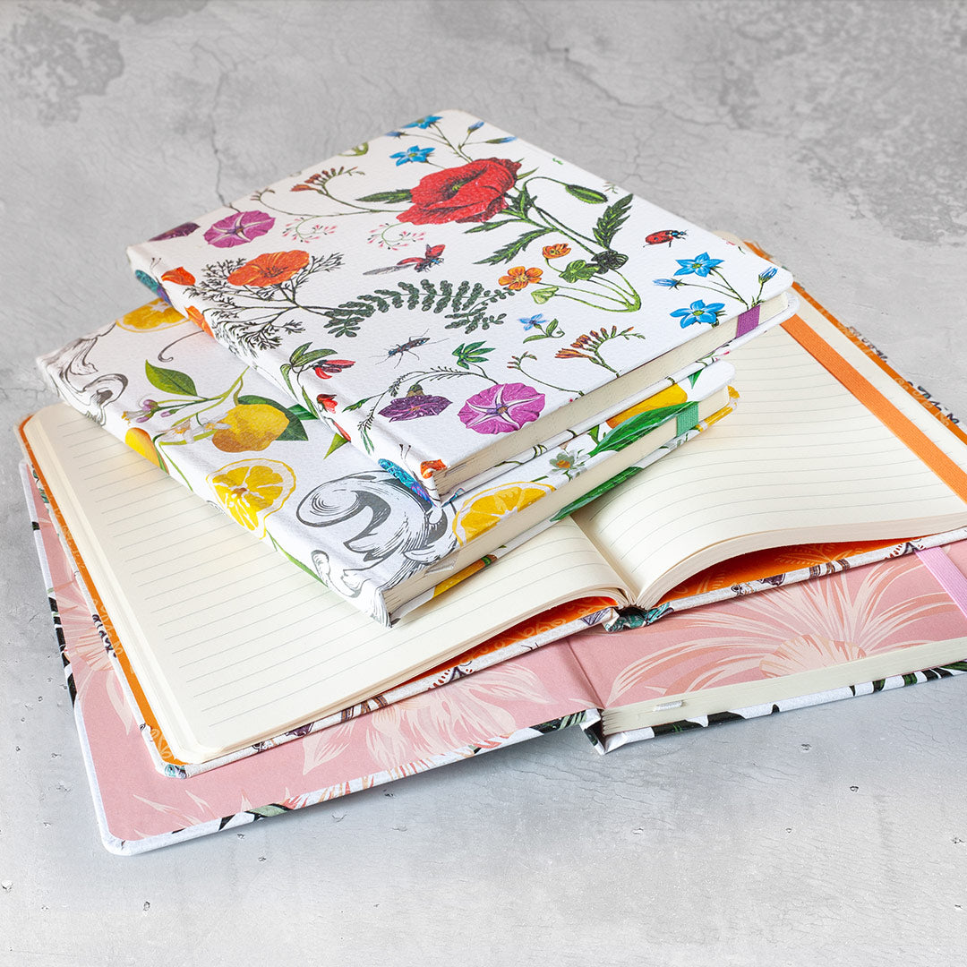 Image shows Floral hardcover journals and its inside pages
