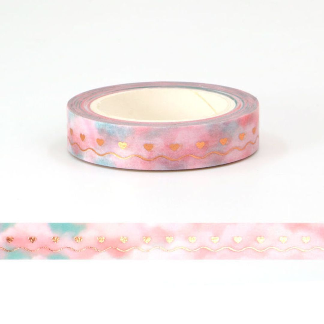 Decorative washi tape with pink and gold heart pattern 