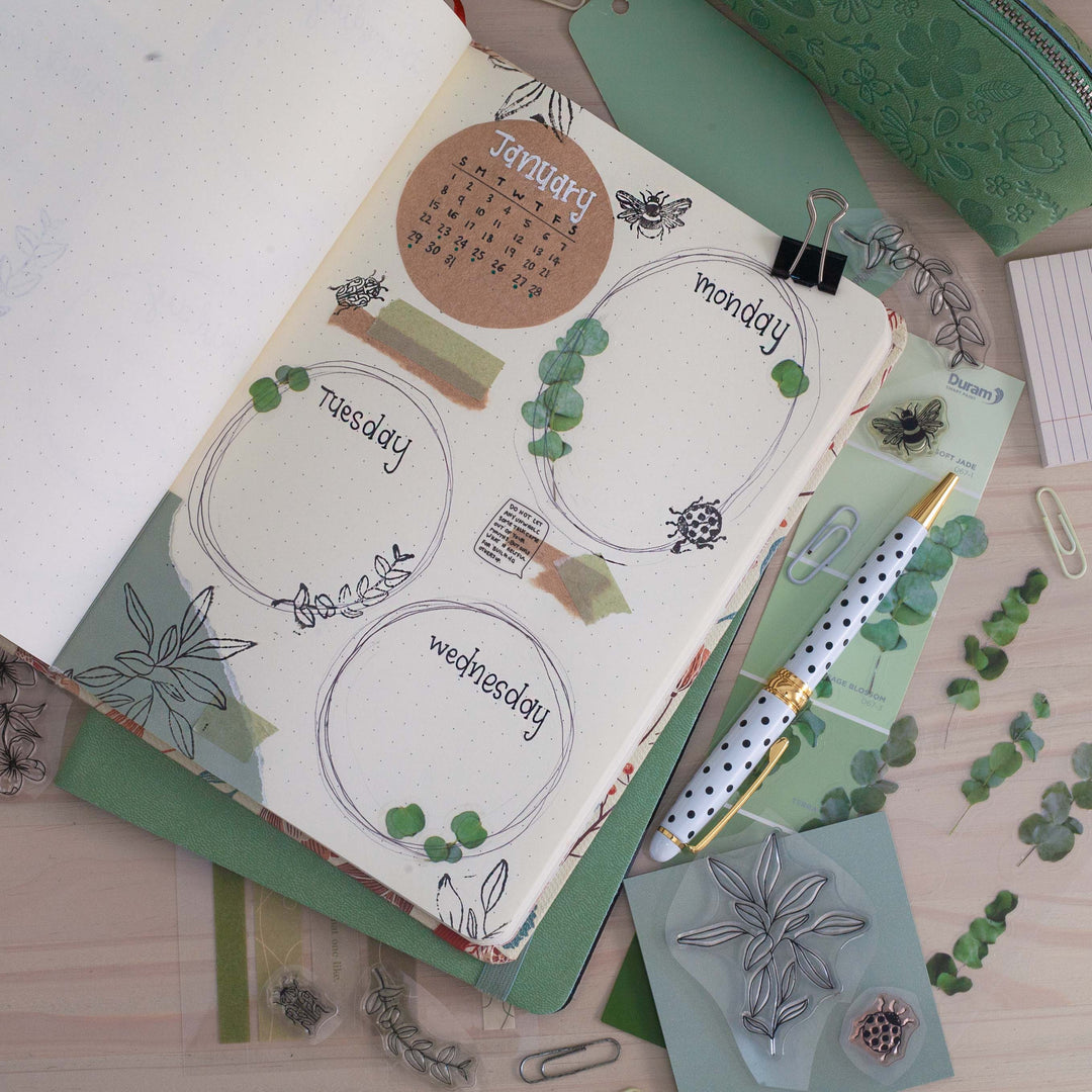 Image shows a green themed journal spread