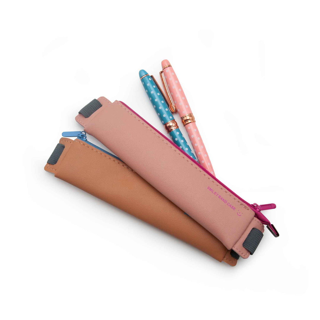 Image shows a pink and brown diary/pencil pouch with pens