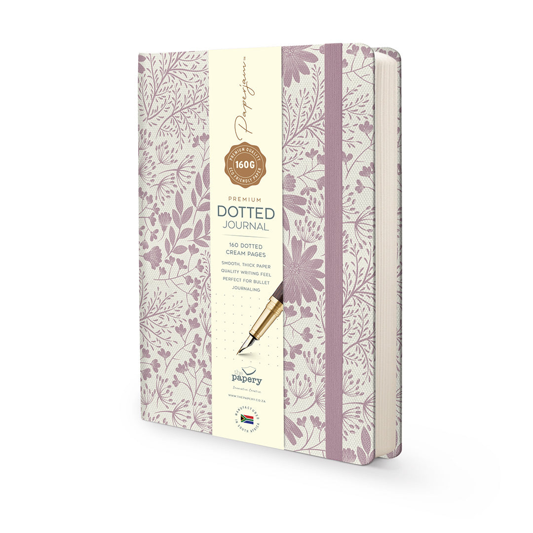 Image shows a spring premium dotted journal