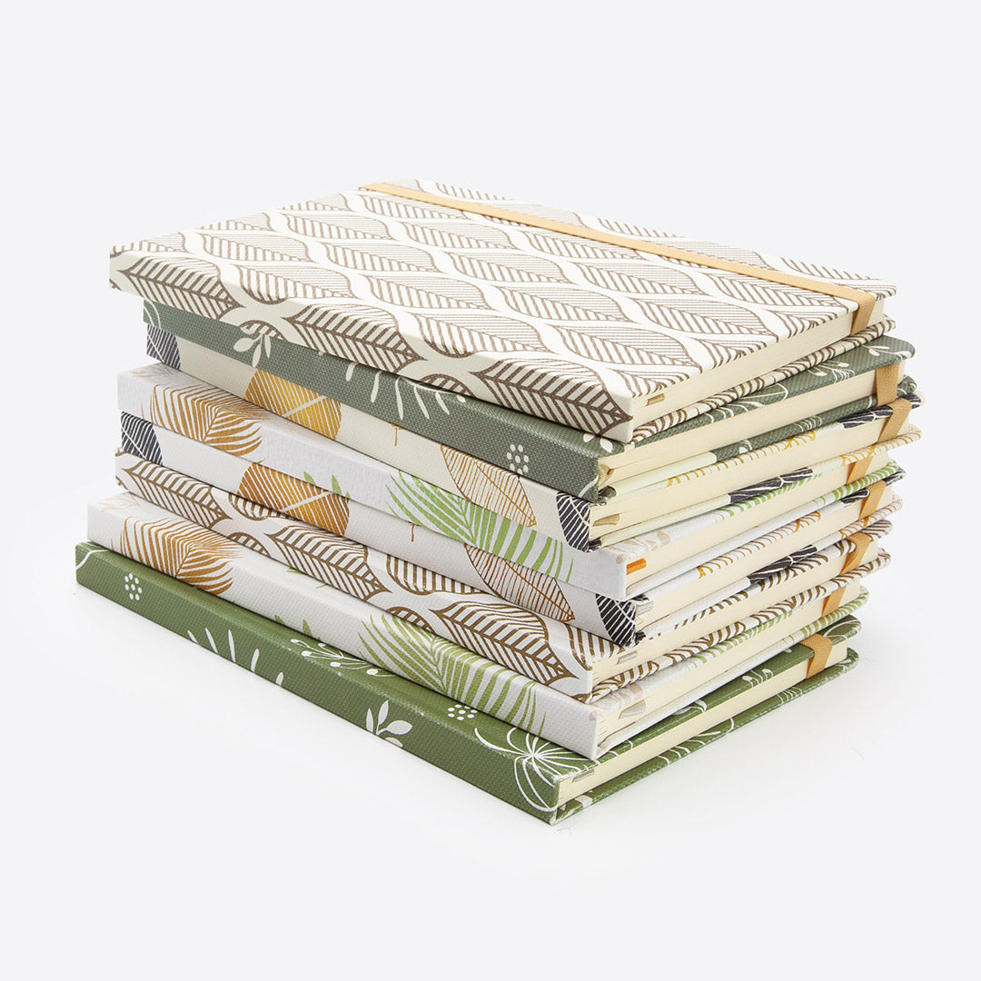 Image shows a group of Nature hardcover journals