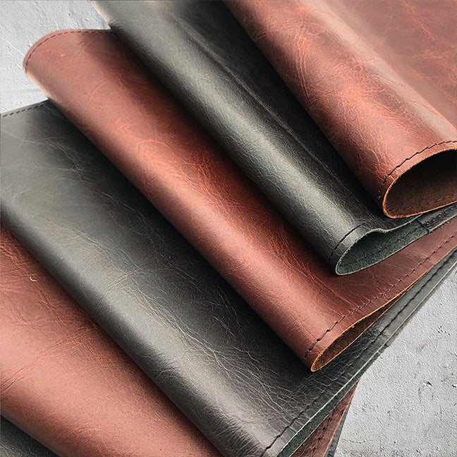 Image shows a group of leather journal covers