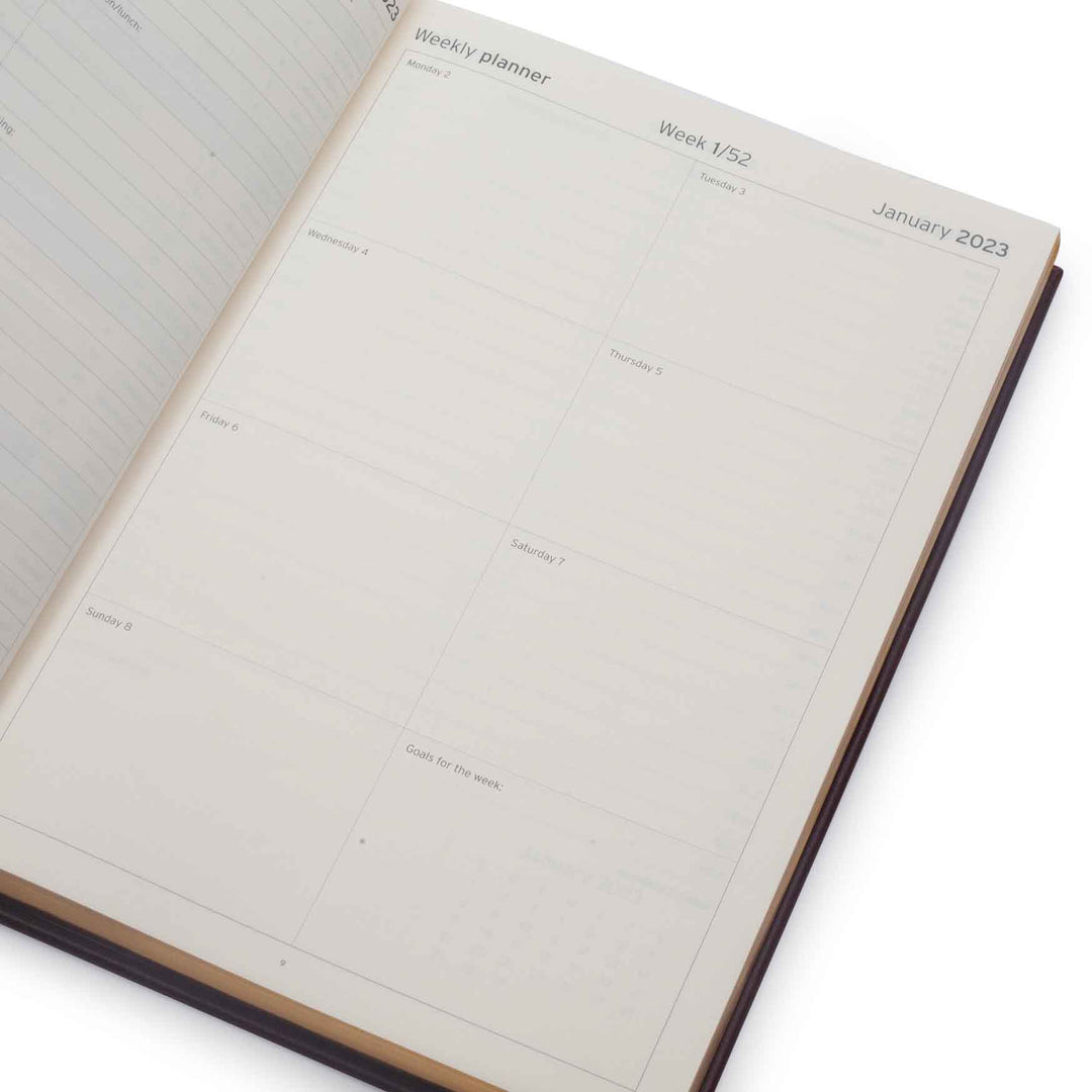 Image shows the weekly planner page in the Rustik Mauriati Planner