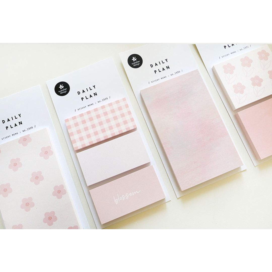 Image shows a group of pink memo pads