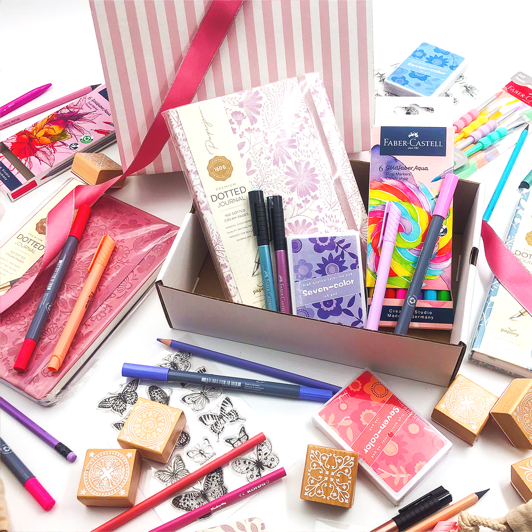 Image shows a box filled with stationery