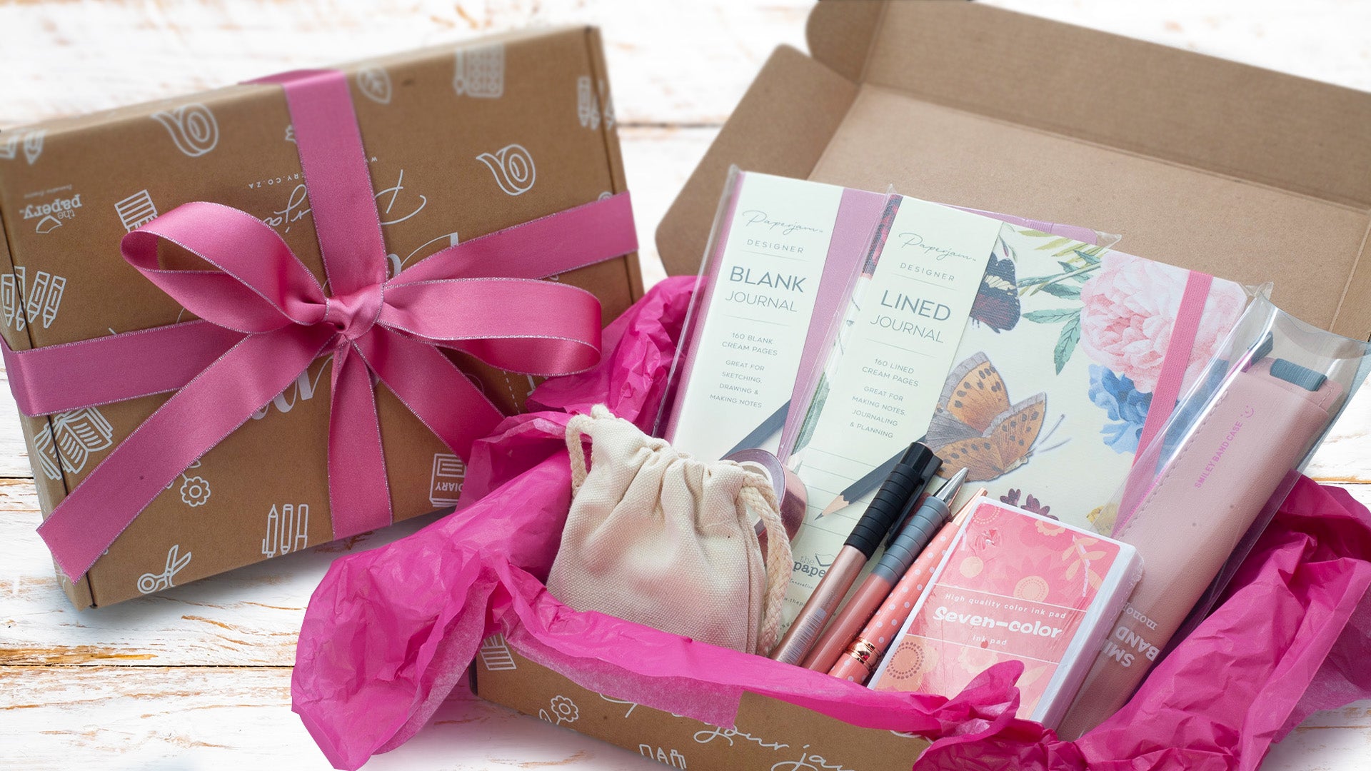Image shows a build-a-box with a pink stationery theme