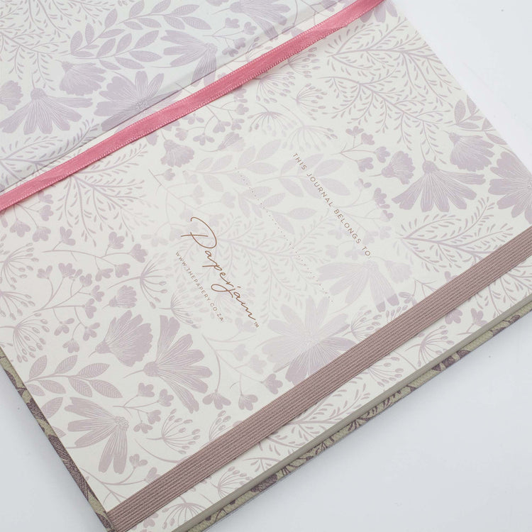 Image shows the endpapers of a spring premium dotted journal
