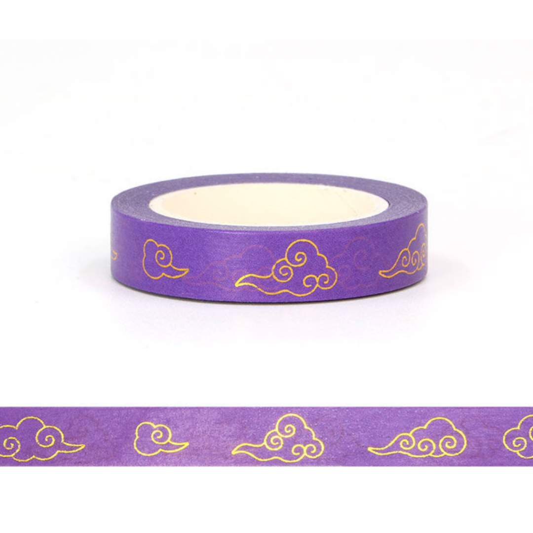 Purple washi tape with gold cloud patterns clouds on a white background