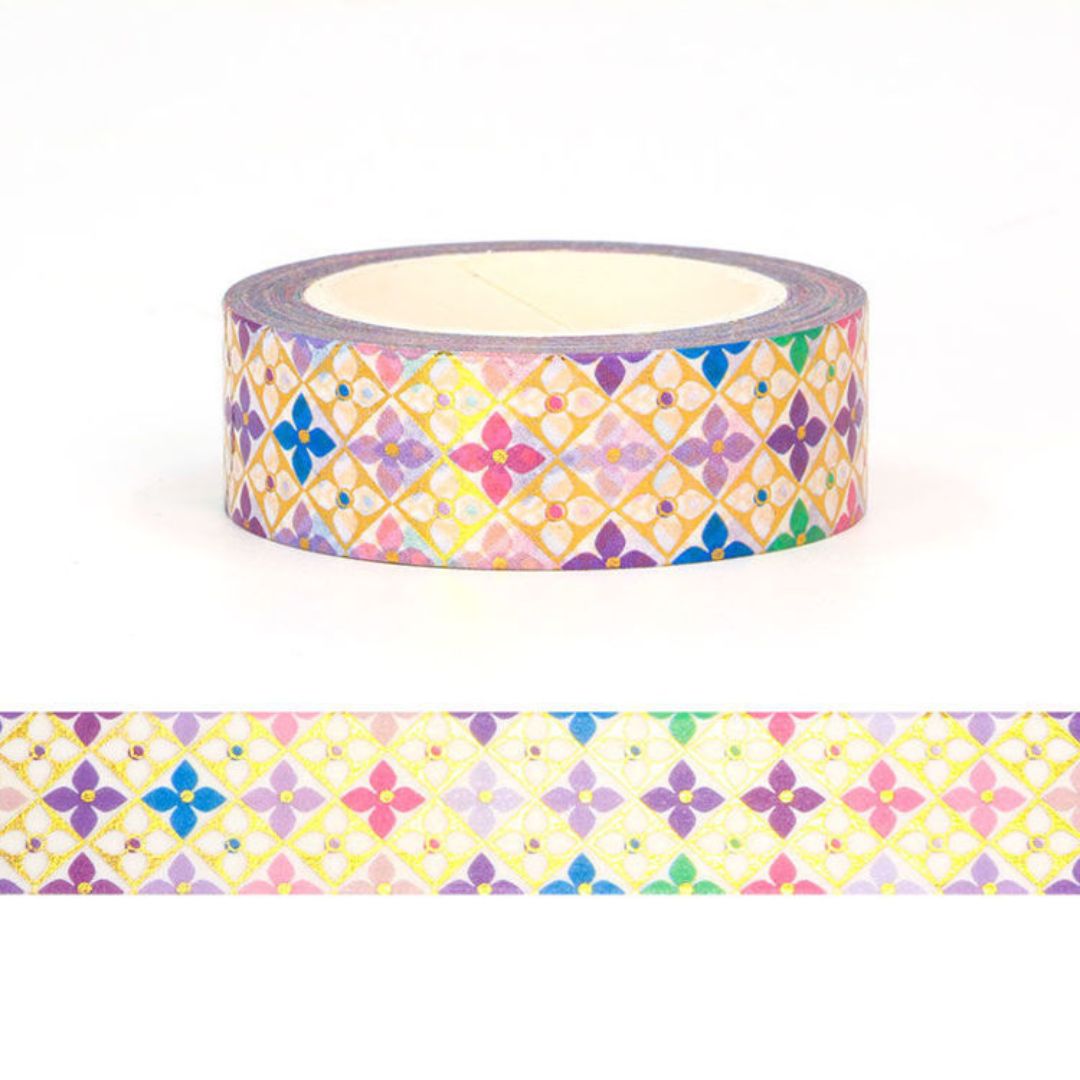 Roll of decorative  washi tape with a colourful  pattern on a white background