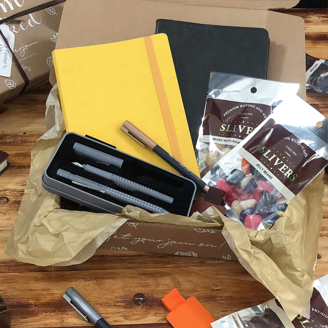 Image shows a stationery box filled with a variety of products