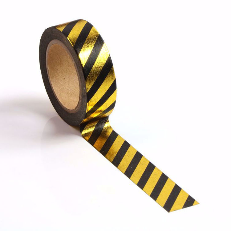 Image shows a black and gold stripes washi tape