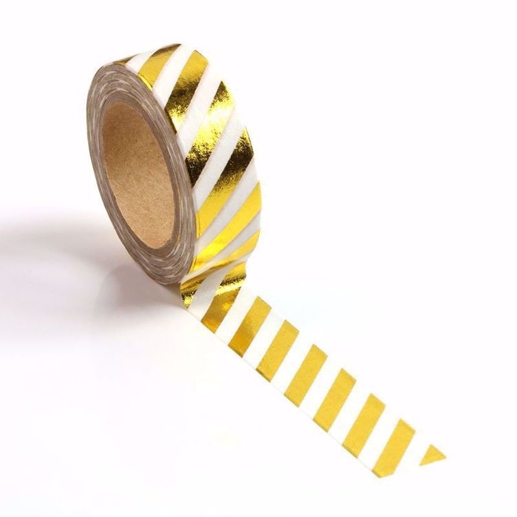 Image shows a gold and white stripped washi tape
