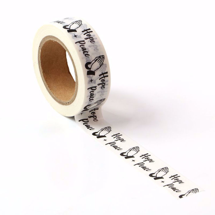 Image shows a washi tape with the words 'hope + peace'